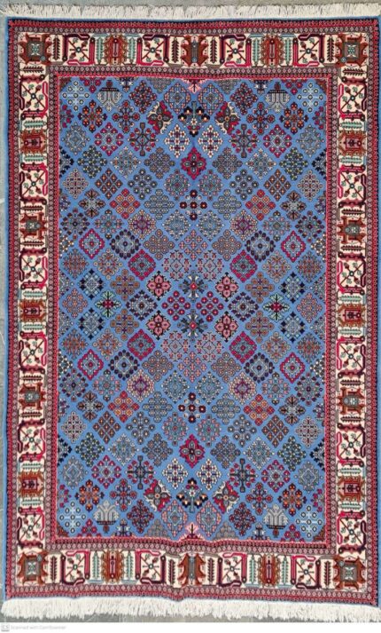 Hand-knotted Persian carpet from Meymeh, Iran with a central medallion and floral design