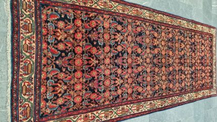 Handwoven Saveh runner with geometric patterns and natural earthy tones from Saveh City, Iran